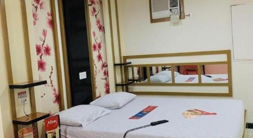 Hotel Sogo Tarlac Экстерьер фото